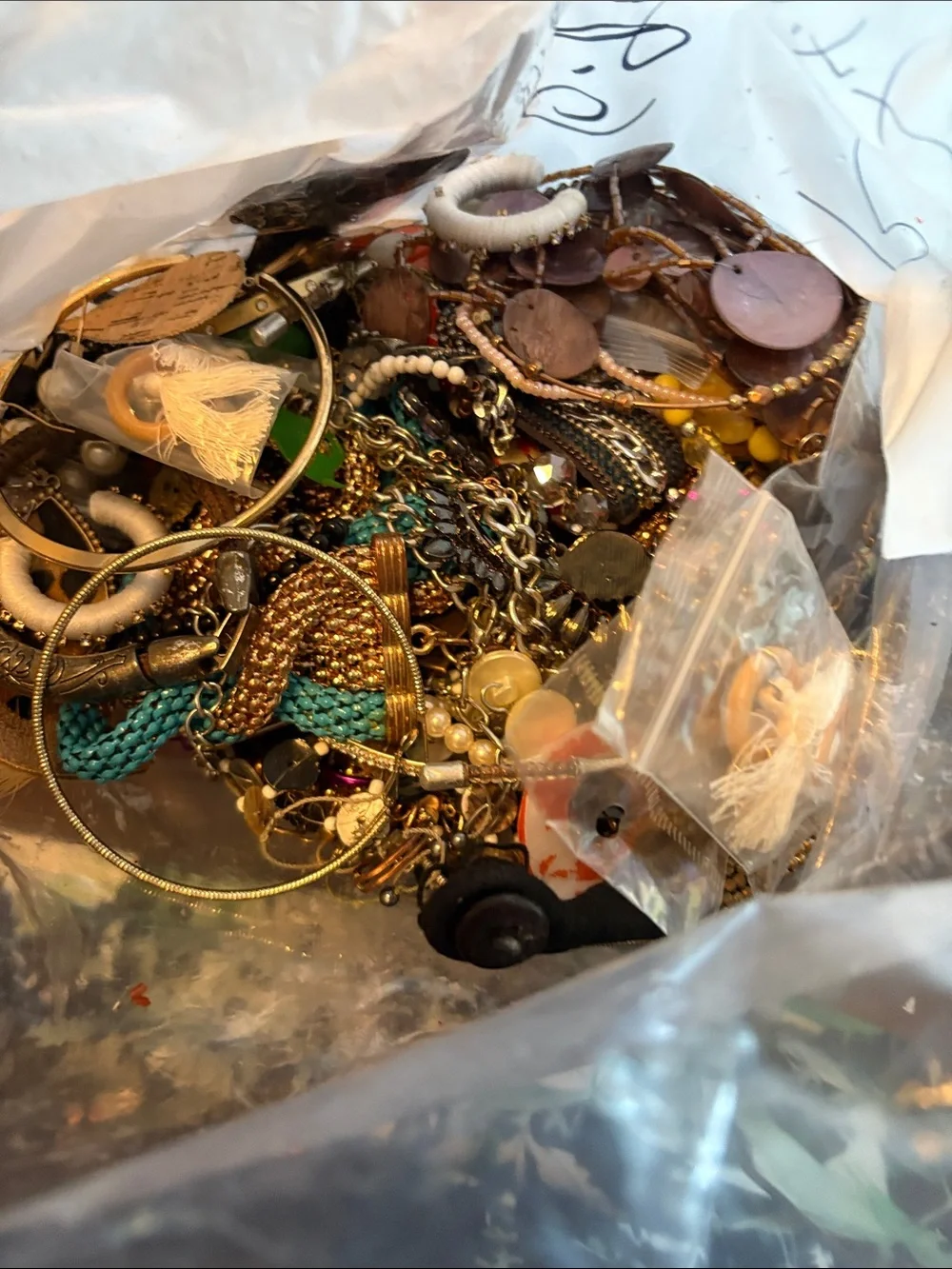Wearable Jewelry in a bag with many different colors and designs LBS 3.14